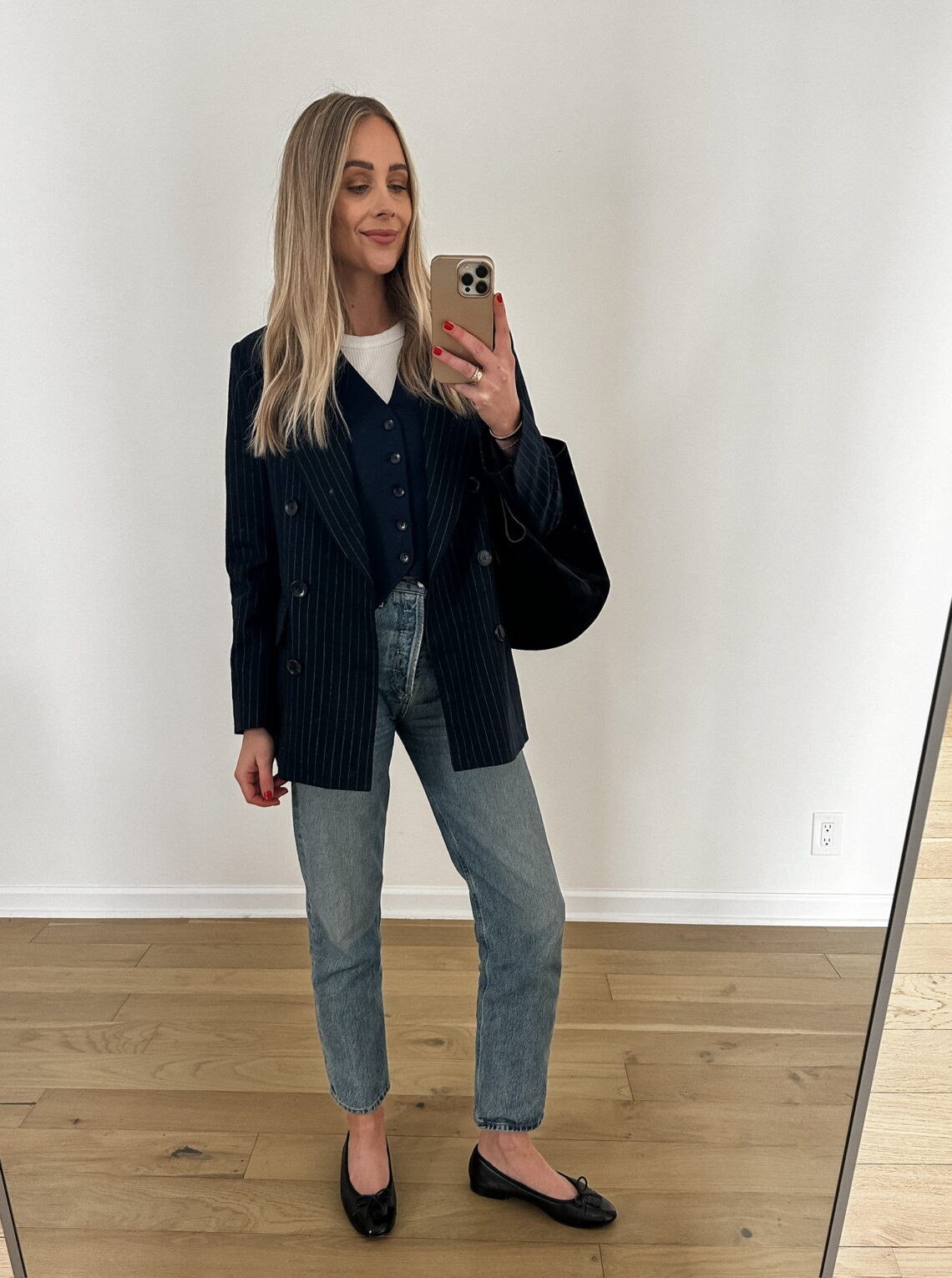 Fashion Jackson wearing MAYSON the label navy pinstripe blazer (small), MAYSON the label navy vest (small), white tank (small) AGOLDE jeans (tts), Daily outfit idea, casual workwear